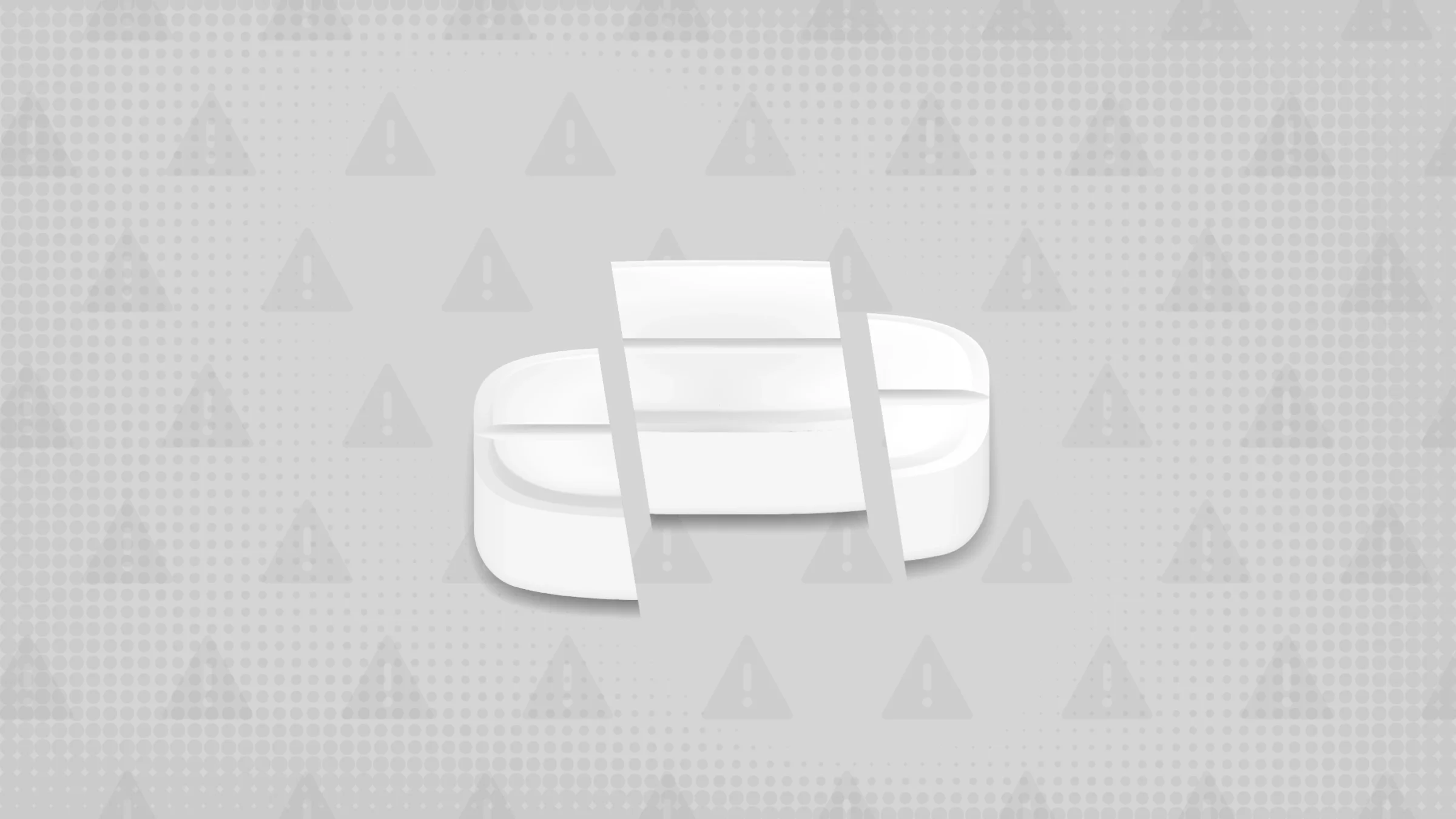 A gray background with texture and warning sign pattern. In the center is a rectangular white pill cut into thirds. 