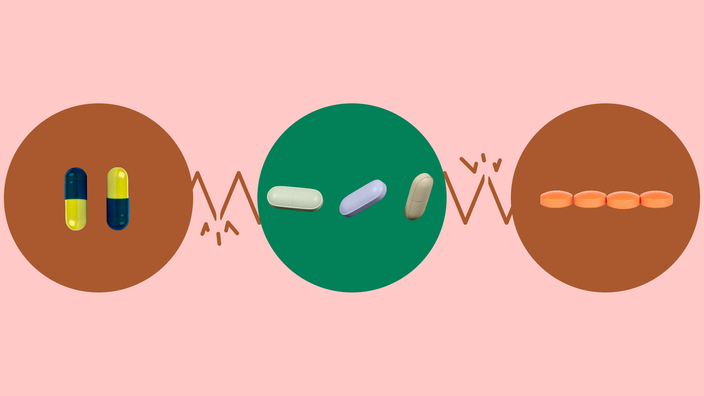 The image shows a light red background with three circles across the frame. In the center, on a green circle, are three pastel colored oblong pills. On the left, on a red circle, are two blue and green capsule pills. On the right, on a red circle, is a line of round orange pills.
