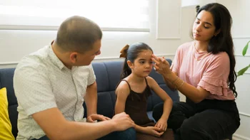 Chickenpox: mother putting ointment on child with chicken pox 1661964505