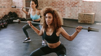 Movement and exercise: squat with barbell 641153436