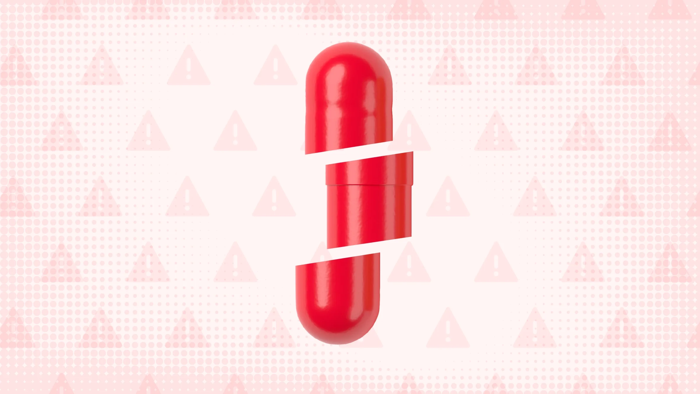 Light red background with texture and warning signs. In the center is a red capsule pill cut into thirds.