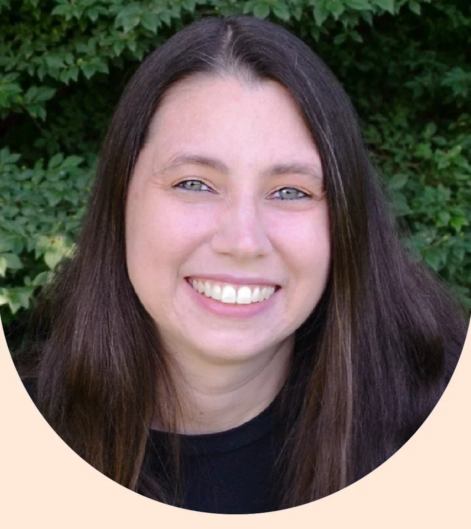 Erin Scott is pictured in a headshot.