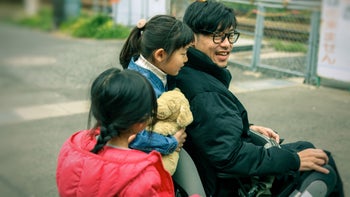 Disability: children with dad in wheelchair 1142652015