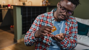 cymbalta: medication: pills: man taking medication home-1389369787