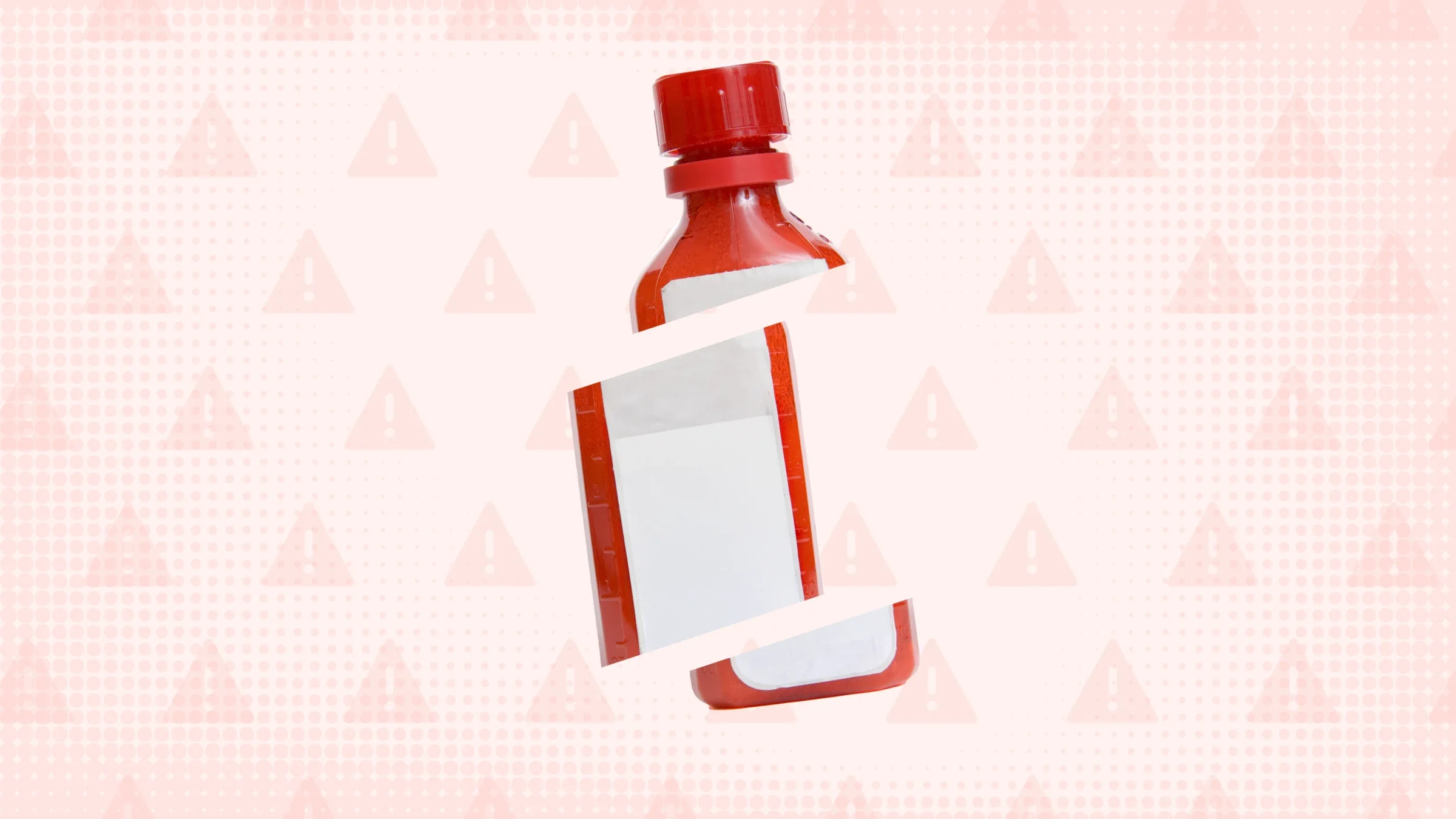 In the center of a light red background with texture and warning sign pattern is a red medicine bottle cut into thirds. 
GoodRx Health
