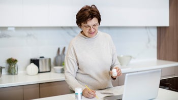 hypertension: telehealth pill bottles taking notes 1363445982