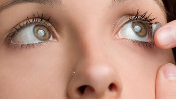 Health: Eye: close up woman contact lens 124537376