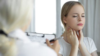 throat: tonsillectomy: touching tonsil doctor taking notes 1267025988
