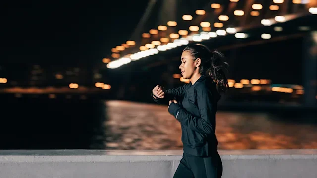 Movement Exercise: woman jogging at night 1322464890