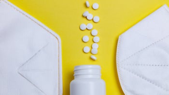 Corticosteroids: Prednisolone vs Prednisone: white pills white masks yellow background-1217011633
