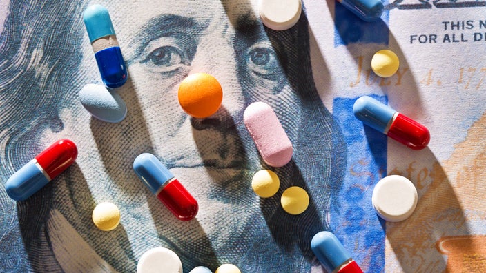 Pills on a dollar bill.