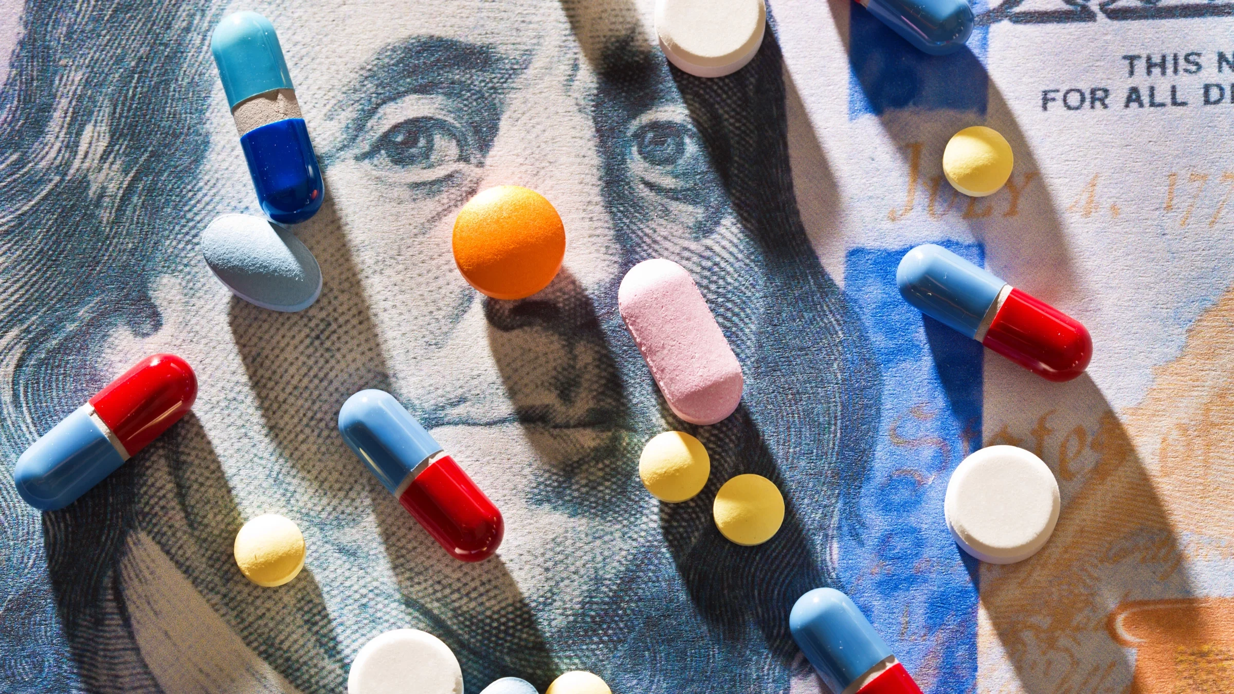 Pills on a dollar bill.