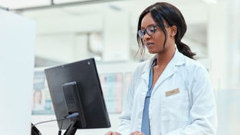 pharmacies: prescriptions: insurance: pharmacist-at-desk-1135285194