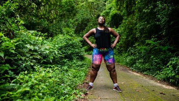 Musculoskeletal: woman taking a break during a walk 1053713854