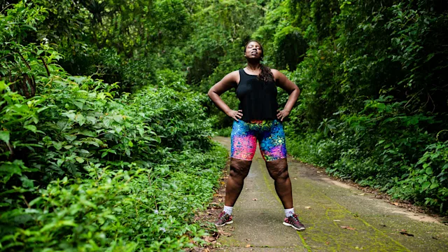 Musculoskeletal: woman taking a break during a walk 1053713854