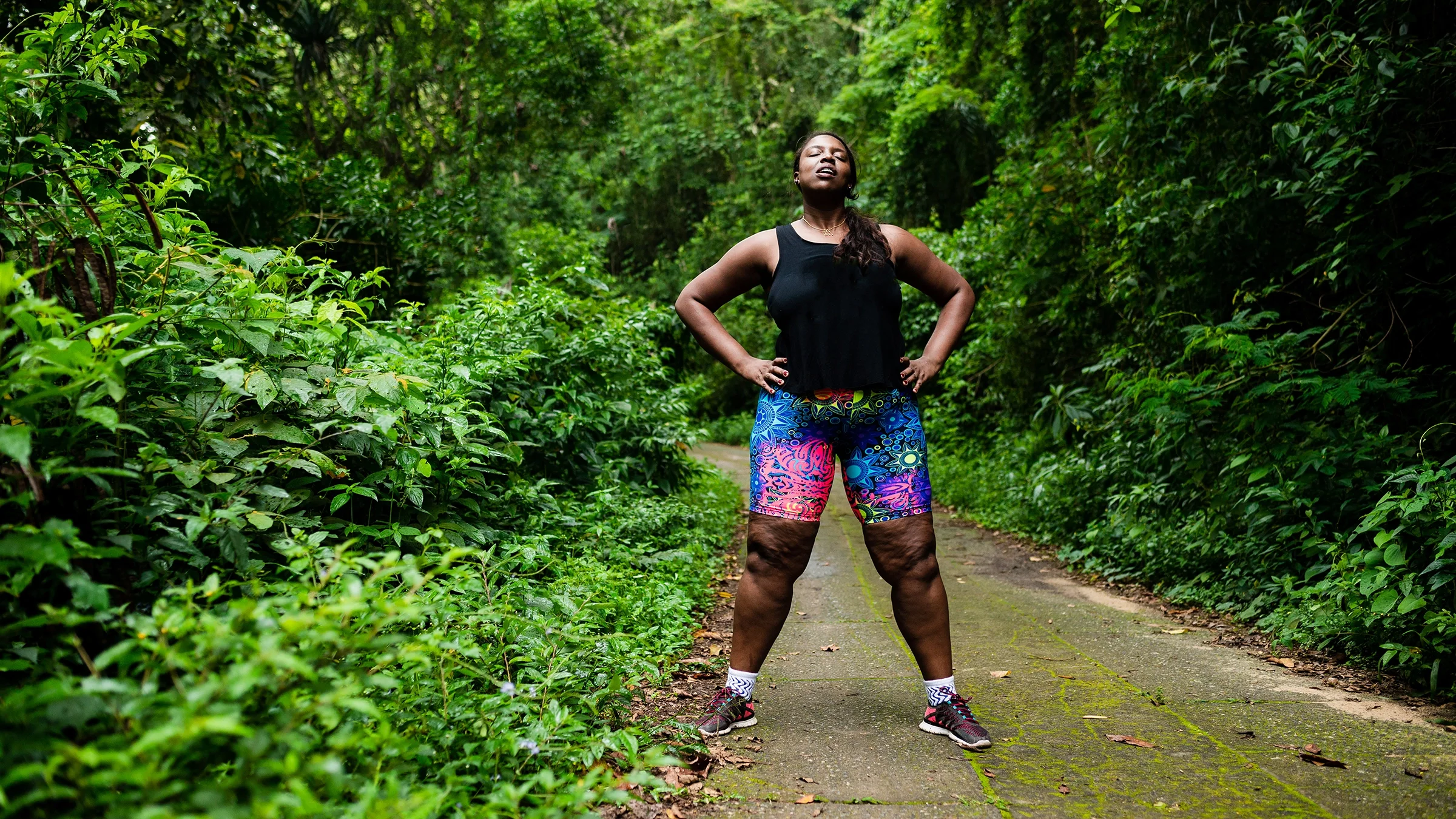 A woman takes a break while out for a walk.