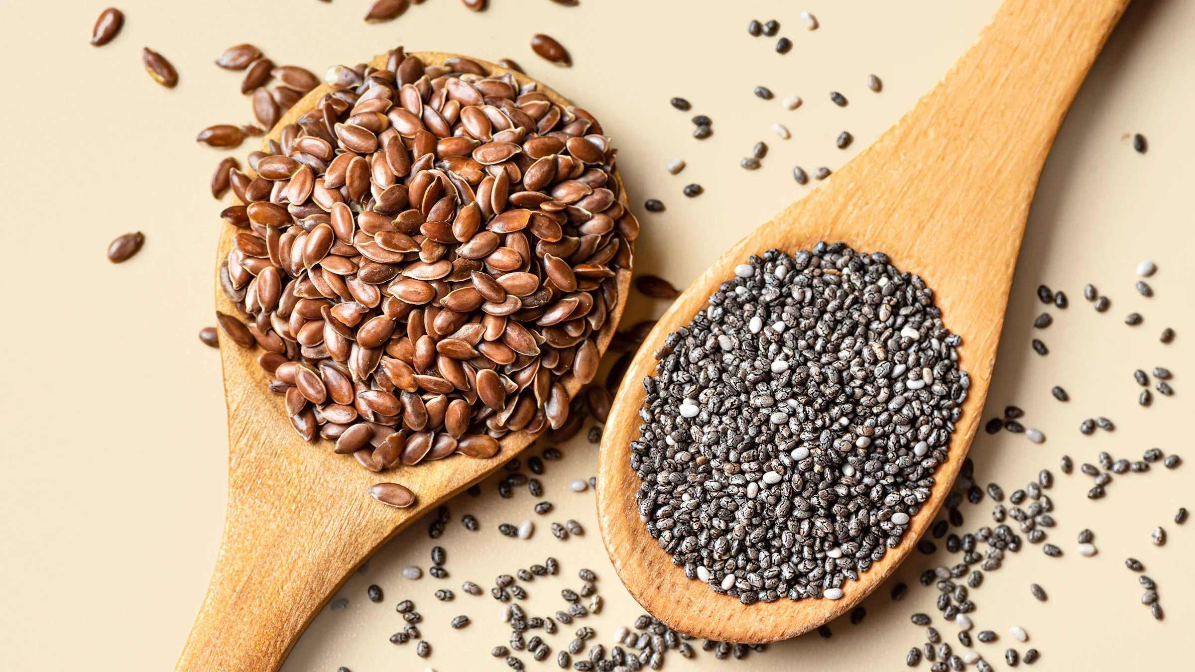 Flaxseeds and chia seeds on spoons.
Mizina/iStock via Getty Images Plus