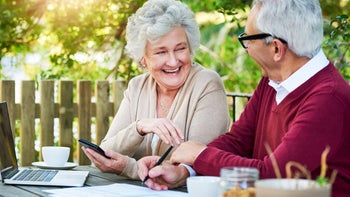 Medicare: Combining: senior couple doing finances 1126133016