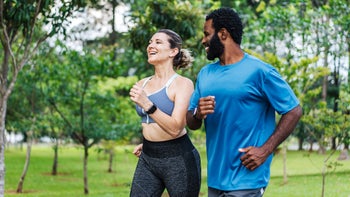 Health: Movement and exercise: couple power walking outdoors 1462659662