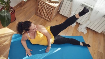 Movement-exercise: woman doing side lift exercise 1424587938
