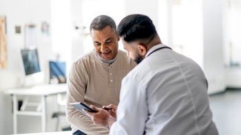entresto: doctor and patient at medical appointment 1442556603