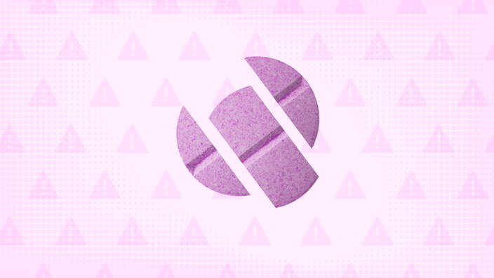  In the center of a light pink background with texture and warning sign pattern is a round pink pill sliced into thirds. 