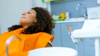 Dental care: nervous patient at the dentist 1264347487