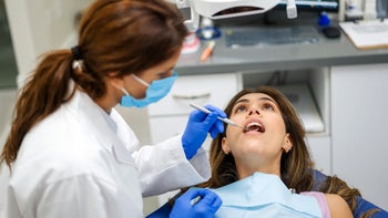 dental care: woman at dental cleaning 1333458385