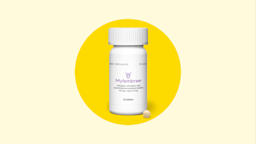 A Myfembree product shot features a white pill bottle with a single light-yellow pill in front on a yellow background.
Courtesy of Sumitomo Pharma America and Pfizer
