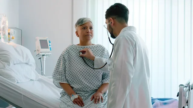 afib: doctor using stethoscope 2162083873