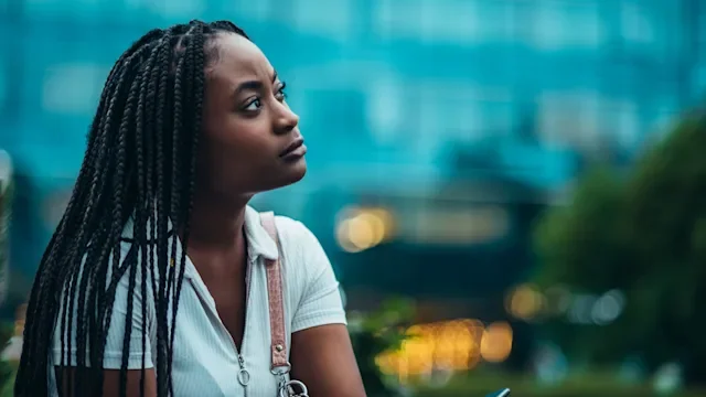 portrait of a beautiful woman cityscape 1322484177