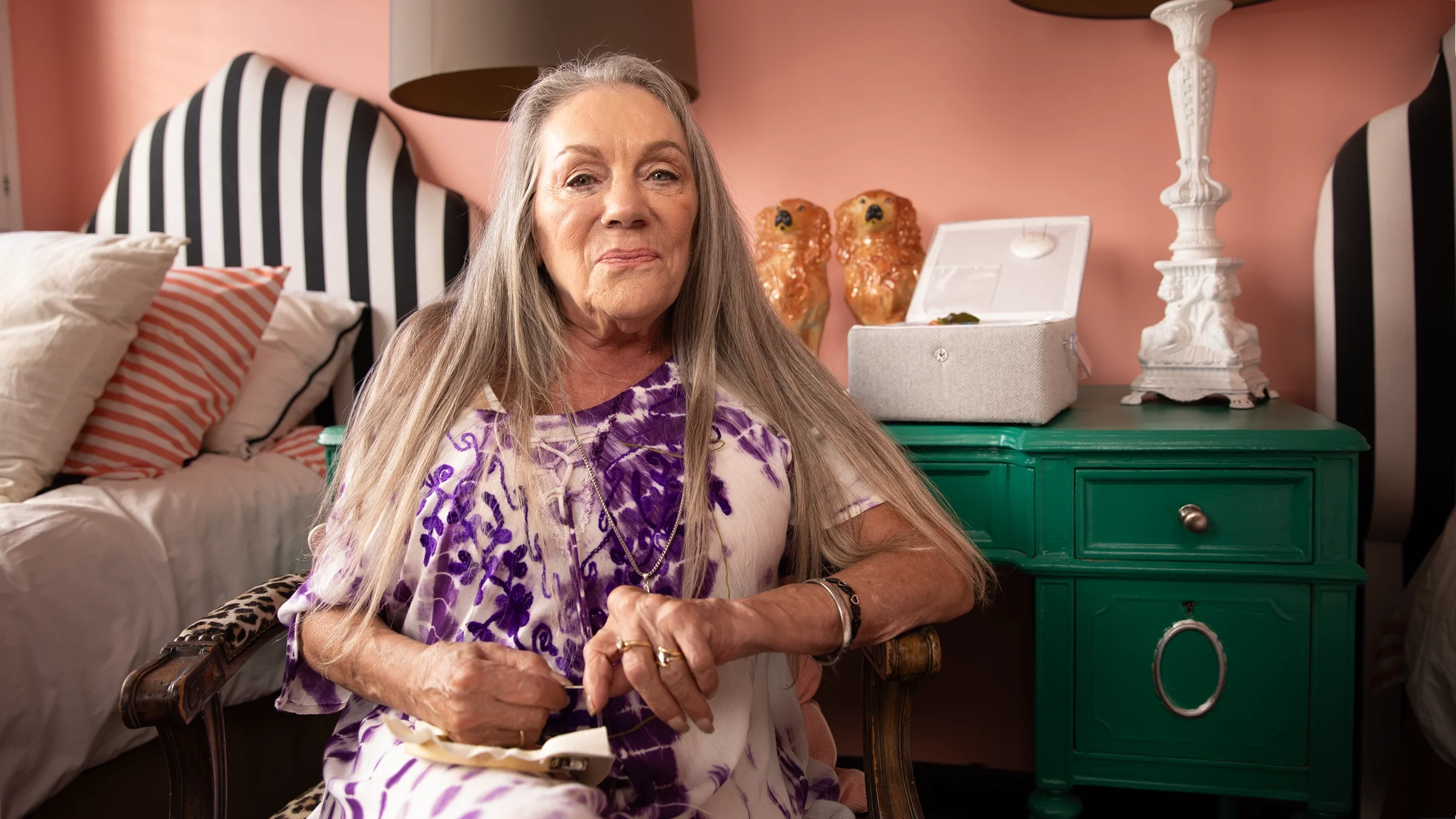 Tam Taylor is pictured in a portrait in her bedroom.