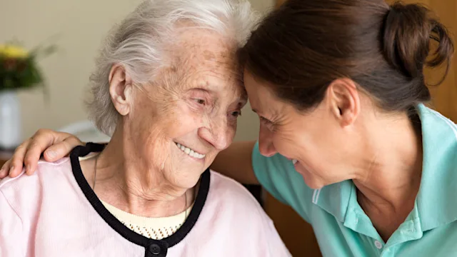 Dementia: adult daughter and senior mother 820952986