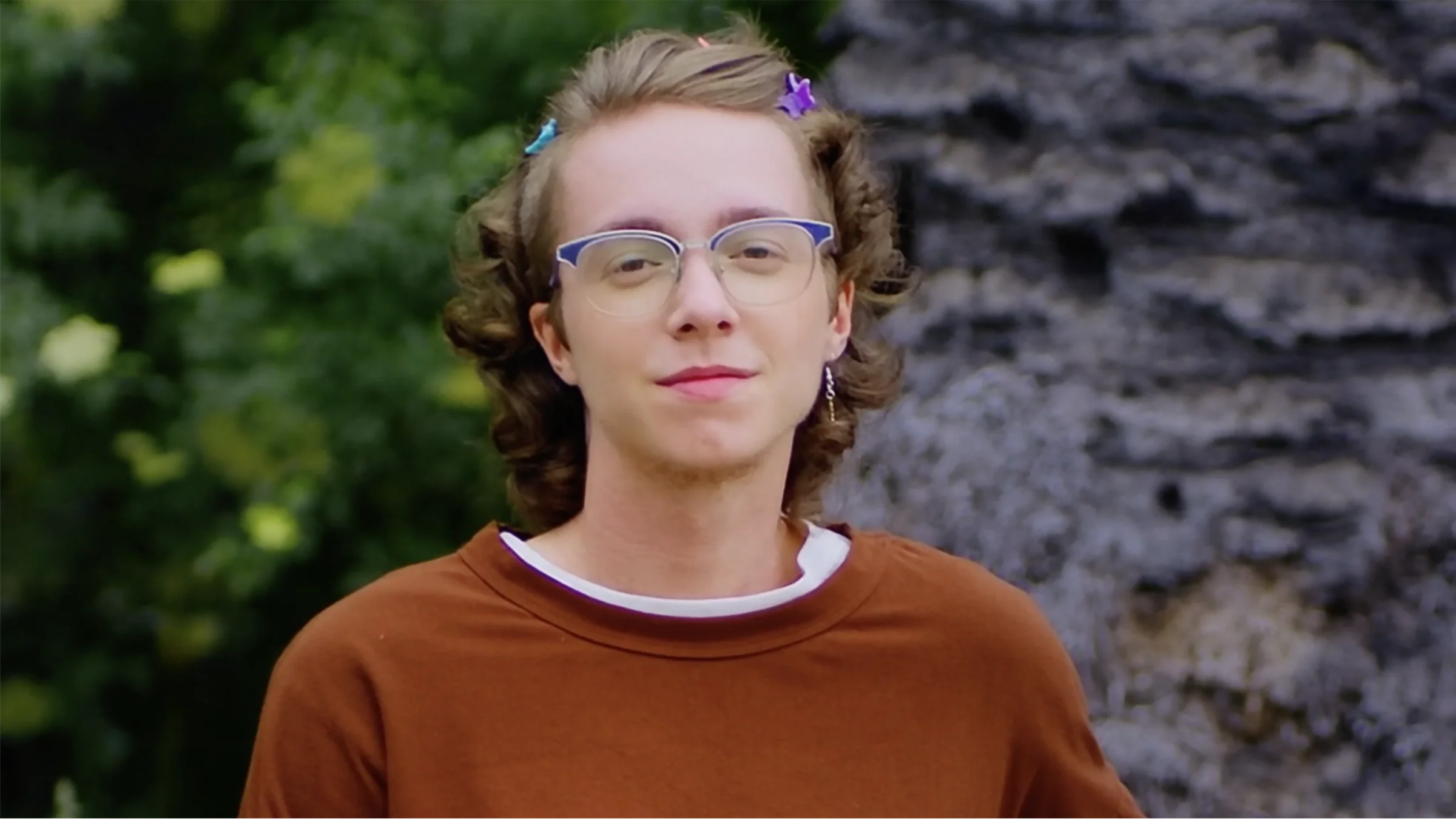 Orion Elis is pictured in a screenshot from a TikTok video they made for GoodRx.