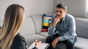 Health: Bipolar disorder: man in therapy session 1131099882