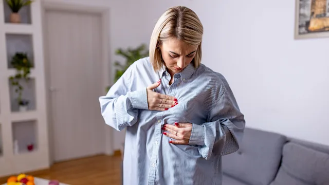 Health: Eating Disorders: examining breast 1443673264