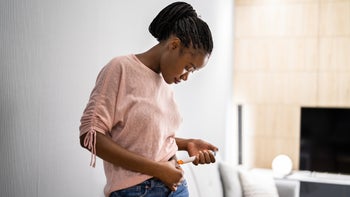 Fertility: woman injection in side 1338374027