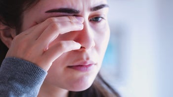 Eye: close-up rubbing irritated eye 1456439383