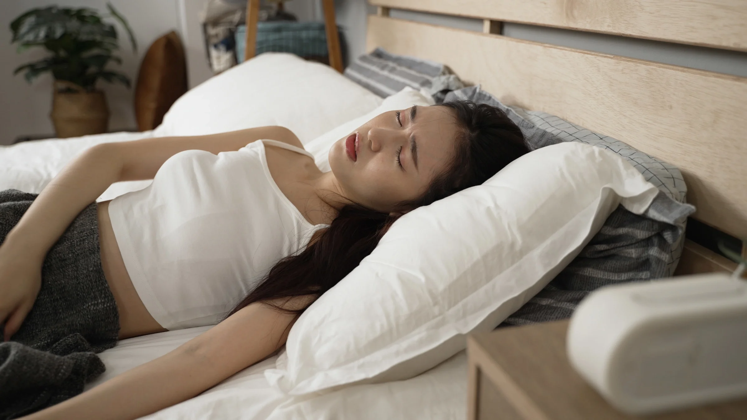 A person who is fatigued in bed.