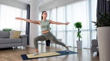 Health: Patient experiences: woman practicing yoga at home 1428036717