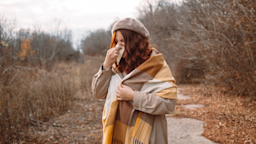 A person with allergies blowing their nose.
Irina Shatilova/iStock via Getty Images 