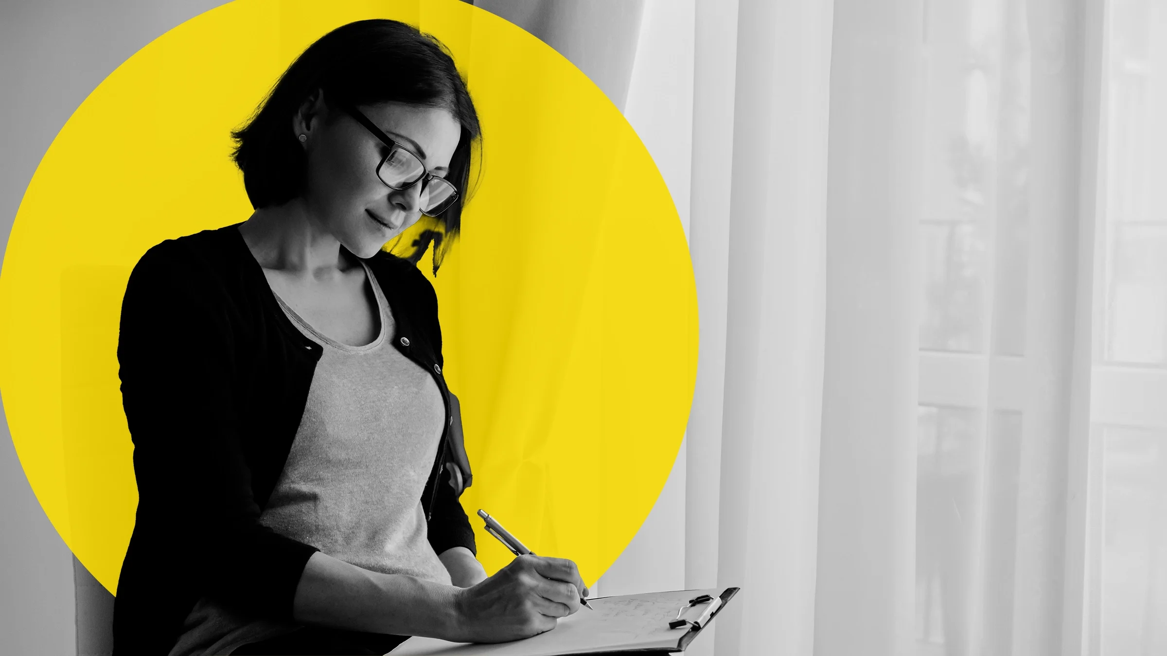Black-and-white image of a woman writing on a clipboard. There is an added yellow GFX circle behind her.