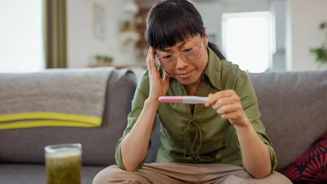 glp-1 agonists: woman awaiting pregnancy results 2150098443