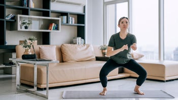 Health: Movement and exercise: woman squat exercise 1432938140
