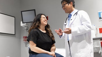 HCP: woman at medical appointment 1994139276