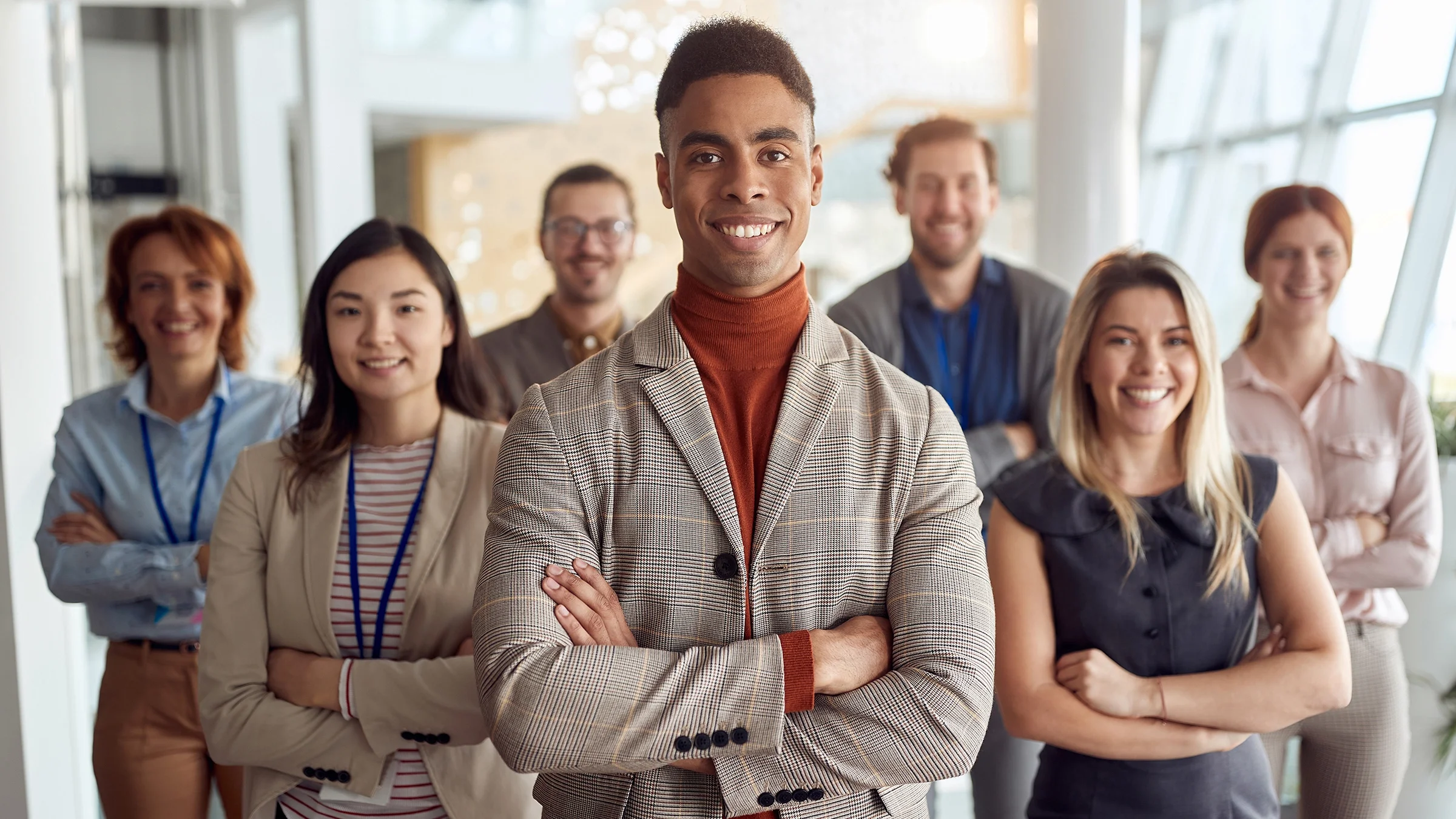 Young professionals standing in a formation in the hospital halls.