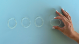 Four contraceptive rings in a row, one is being held.
Irina Chetverikova/iStock via Getty Images 
