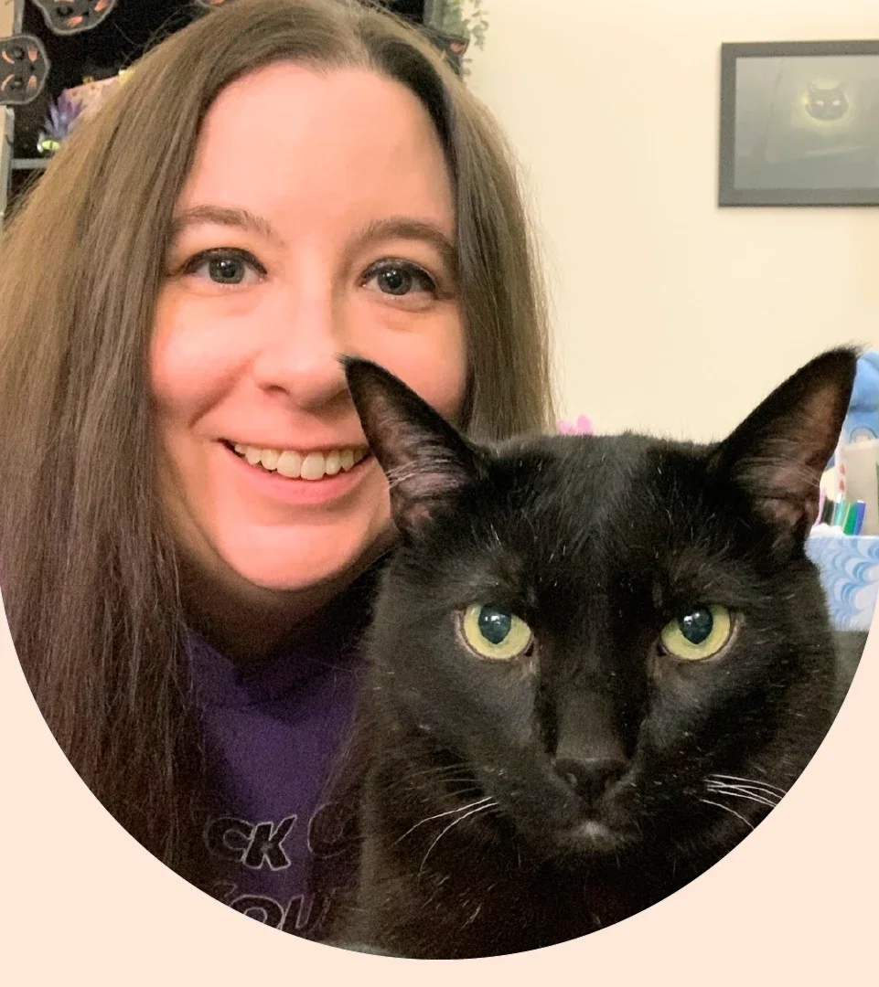 Nikki Hess is pictured with her cat, Manny Halloween Cat.