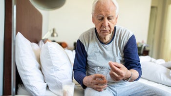 kidneys: senior man taking medication 1207051801