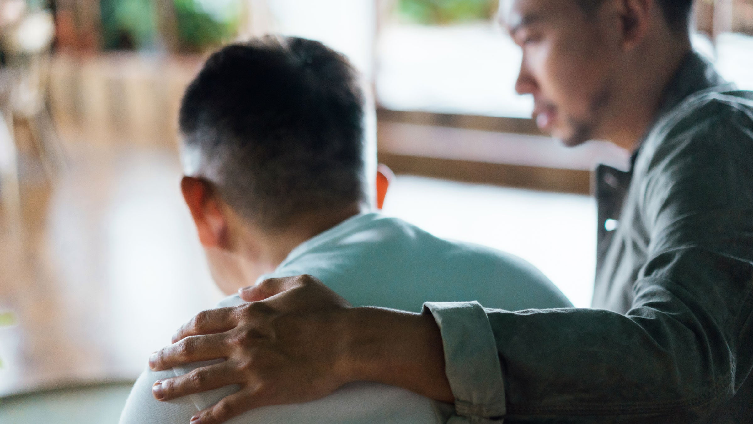 Patient Advocacy: Caregiving: son arm around father 1349214017